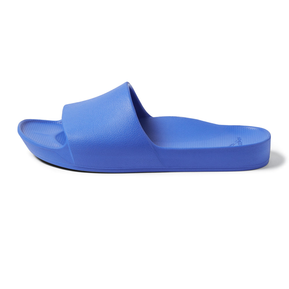 Royal Blue Arch support slides left shoe facing left studio image 