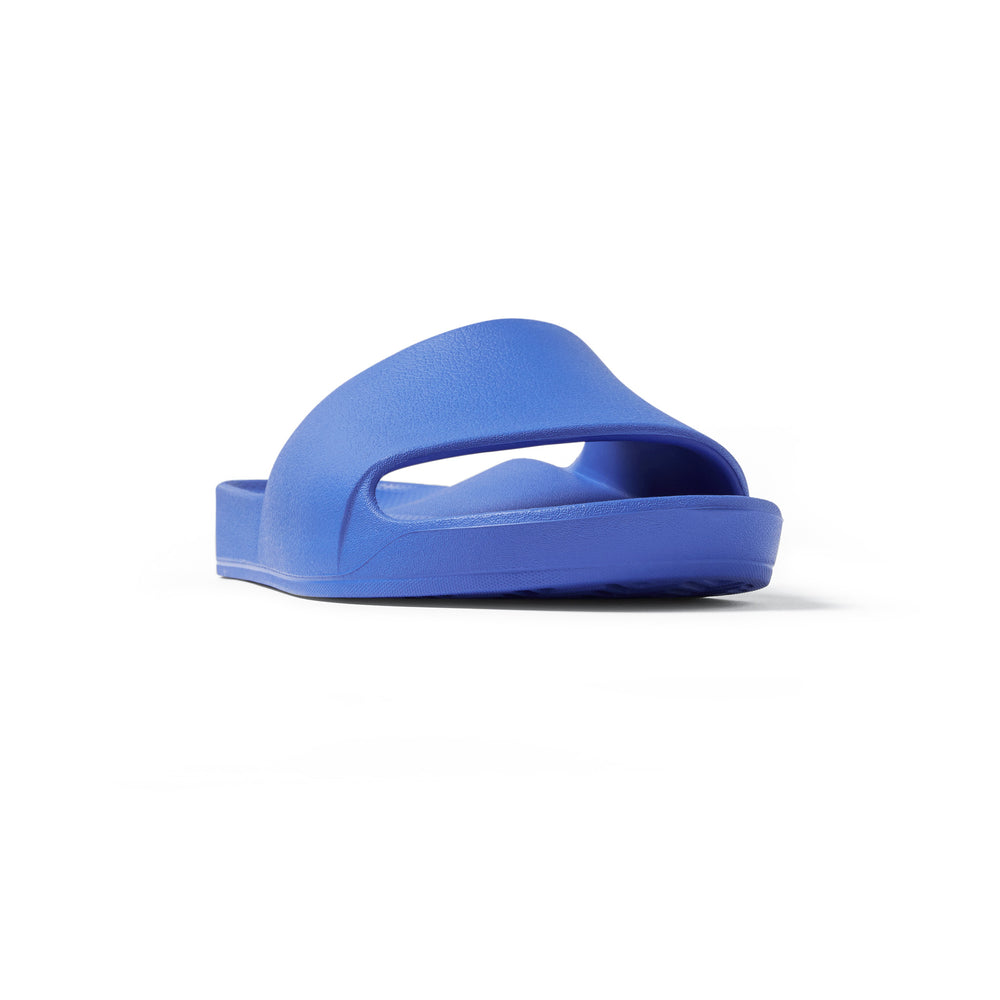 Royal Blue Arch support slides right shoe facing front on studio image 