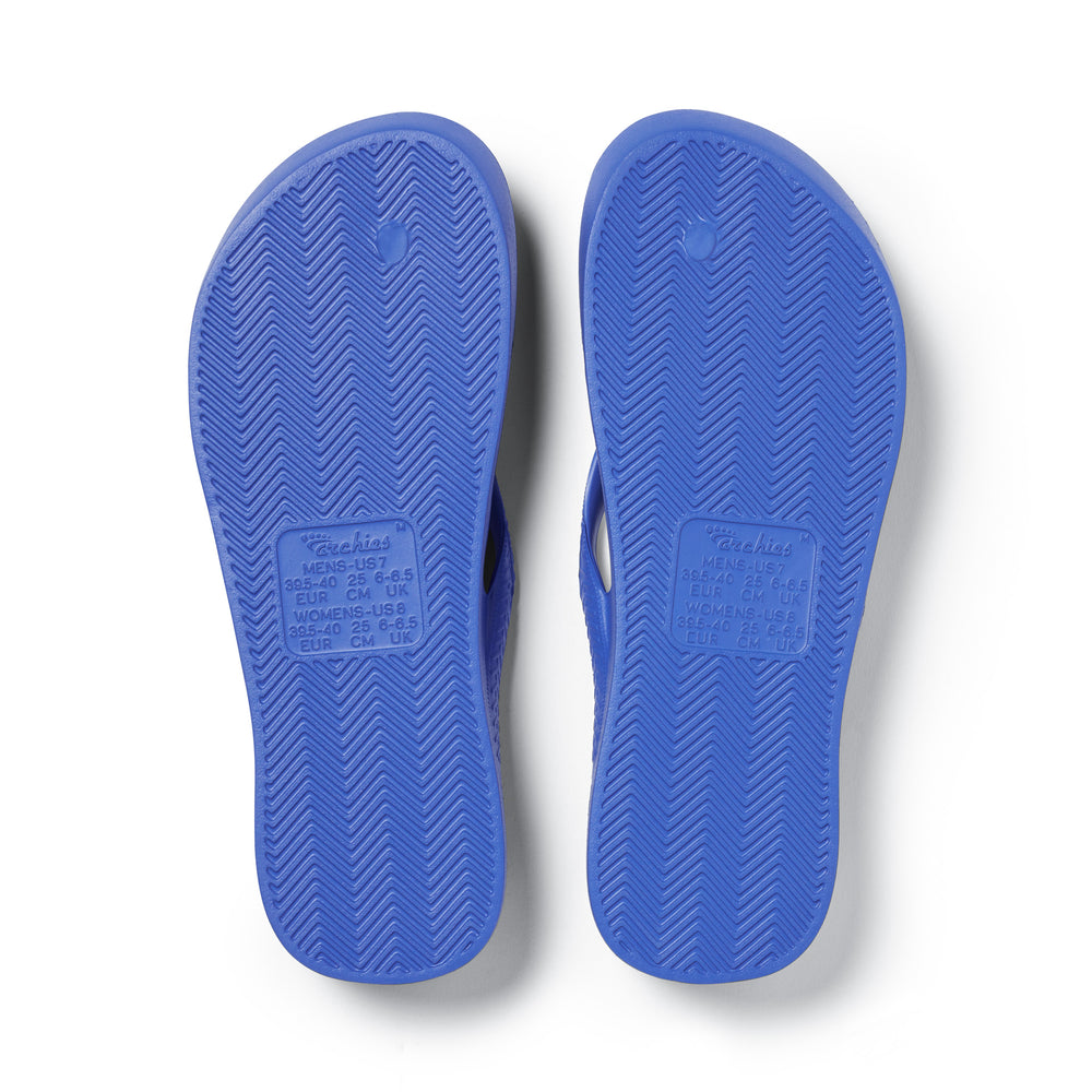 Royal Blue Arch support flip flops bottom of shoes studio image 