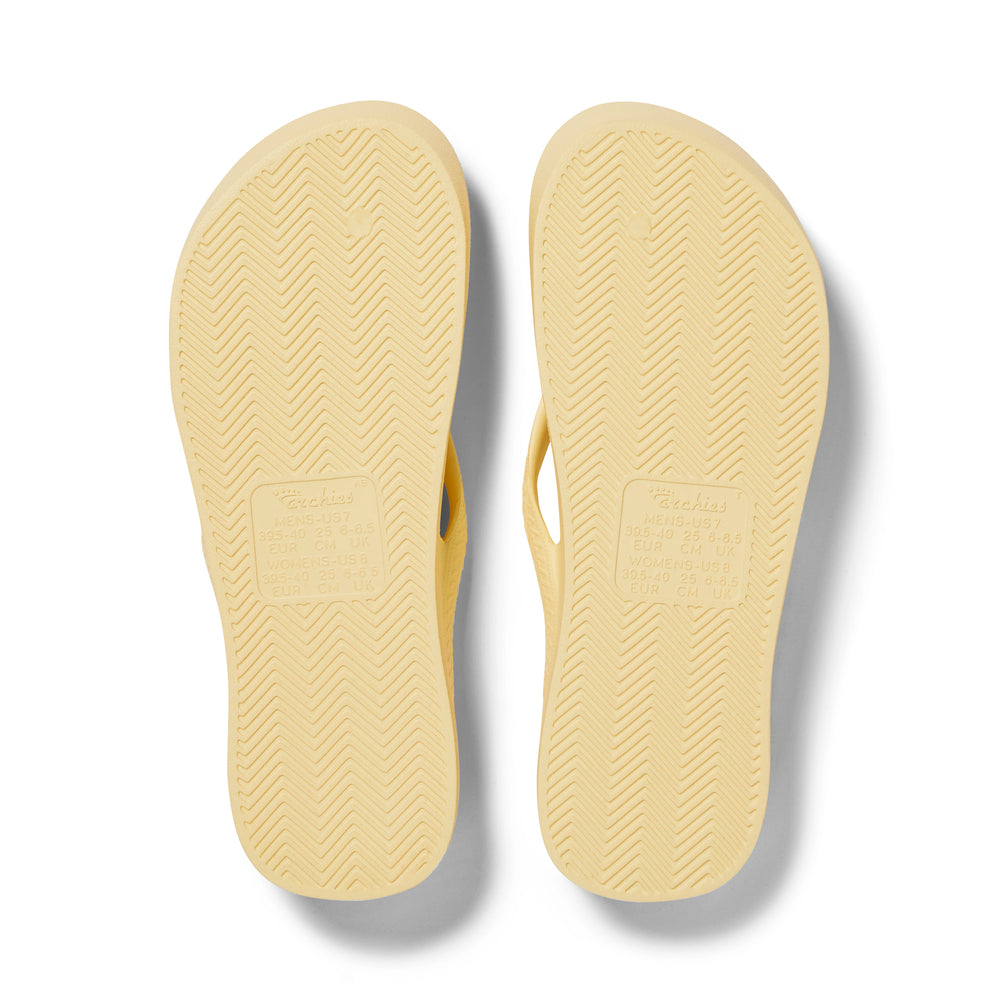 Lemon Arch Support Flip Flops shown from the underside 