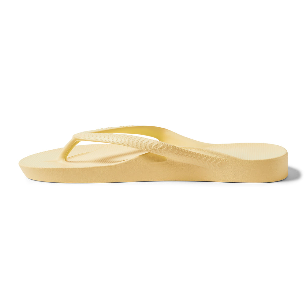 Lemon Arch Support Flip Flops shown from the side 