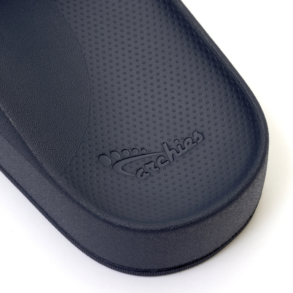Navy Archies Arch Support Slides showing the deep heel cup 